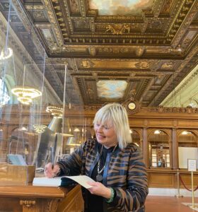 Danute Debney Shaw signing her book “How The Tin Man Found His Brain” for the NYC Public Library